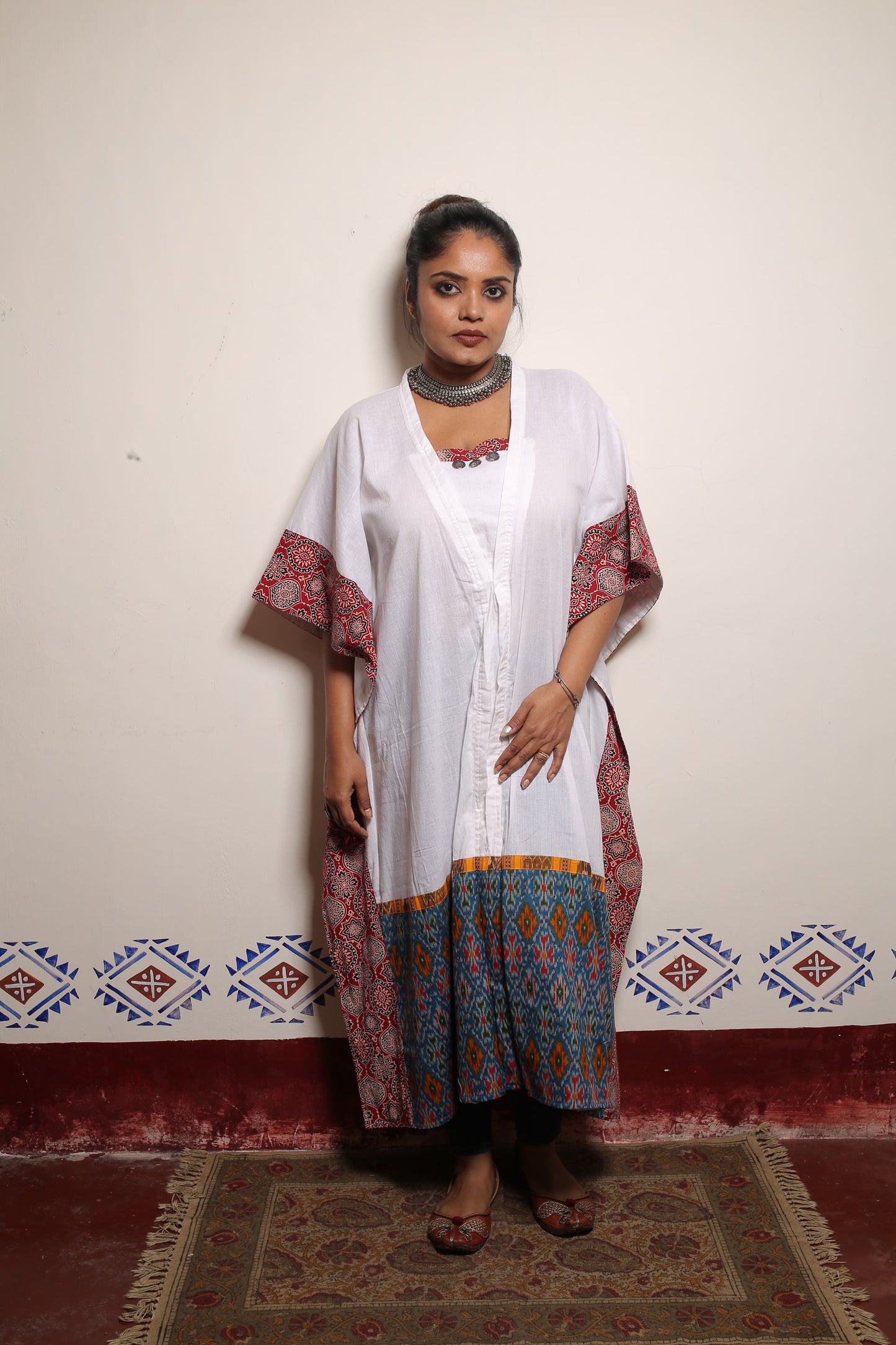 White long Kaftan bordered and designed with rust azrakh