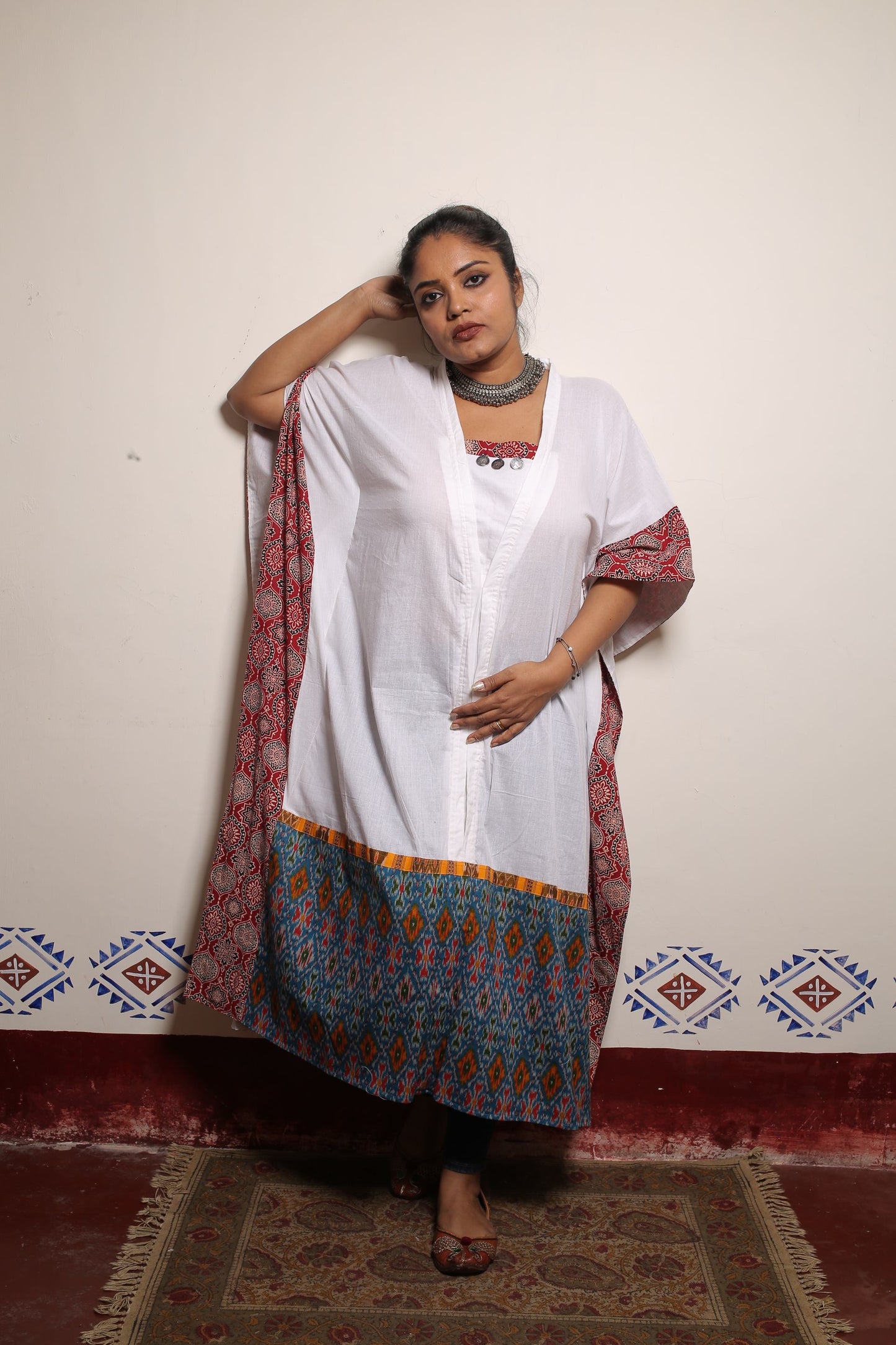 White long Kaftan bordered and designed with rust azrakh