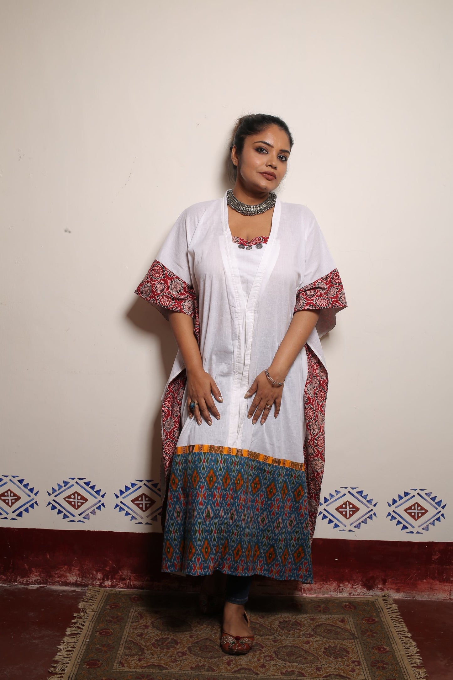 White long Kaftan bordered and designed with rust azrakh